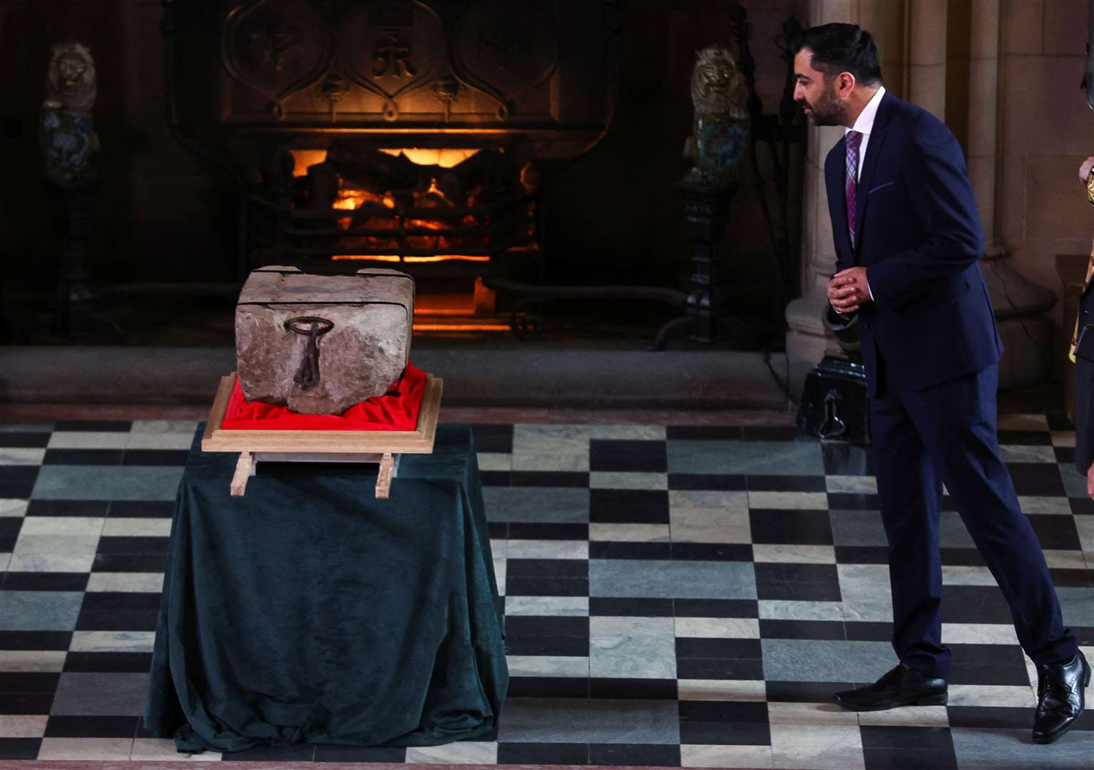 First Minister Humza Yousaf views the Stone of Destiny at Edinburgh Castle (Russell Cheyne/PA)