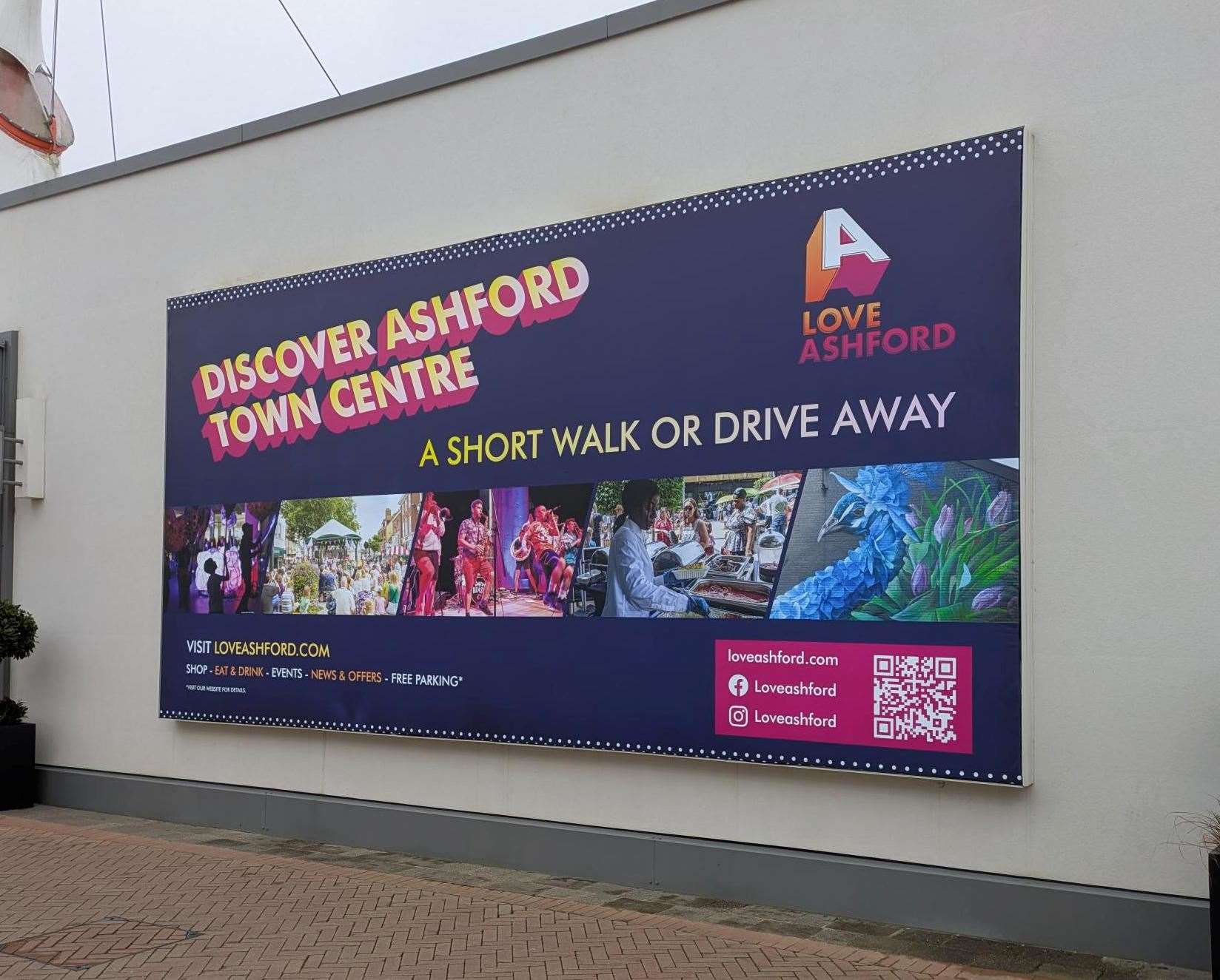 A new billboard promoting the town centre has been installed at the Designer Outlet. Picture: Ashford Borough Council