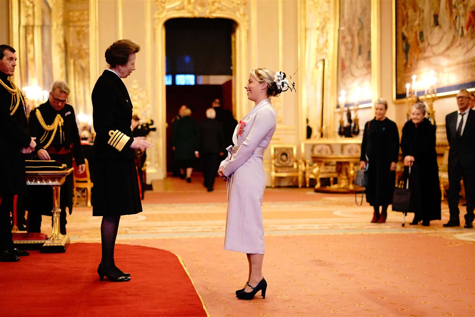 Sophie Wells, from Lincoln, is made an Officer of the Order of the British Empire by the Princess Royal (Yui Mok/PA)