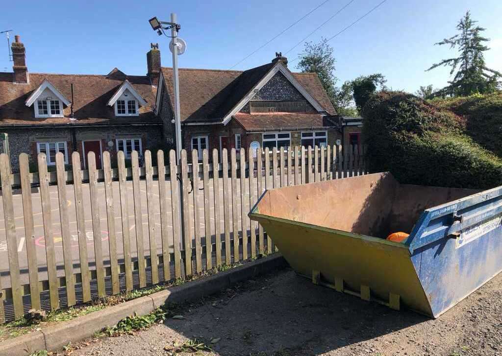 The books were spotted in a skip outside the school near Sittingbourne