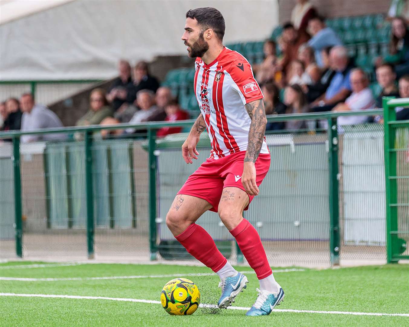 Joan Luque on the ball for Folkestone in their 2-0 weekend win at Ashford. Picture: Helen Cooper