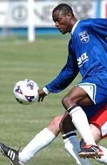 SAM SODJE: nodded home free kick. Picture: SIMON BURCHETT