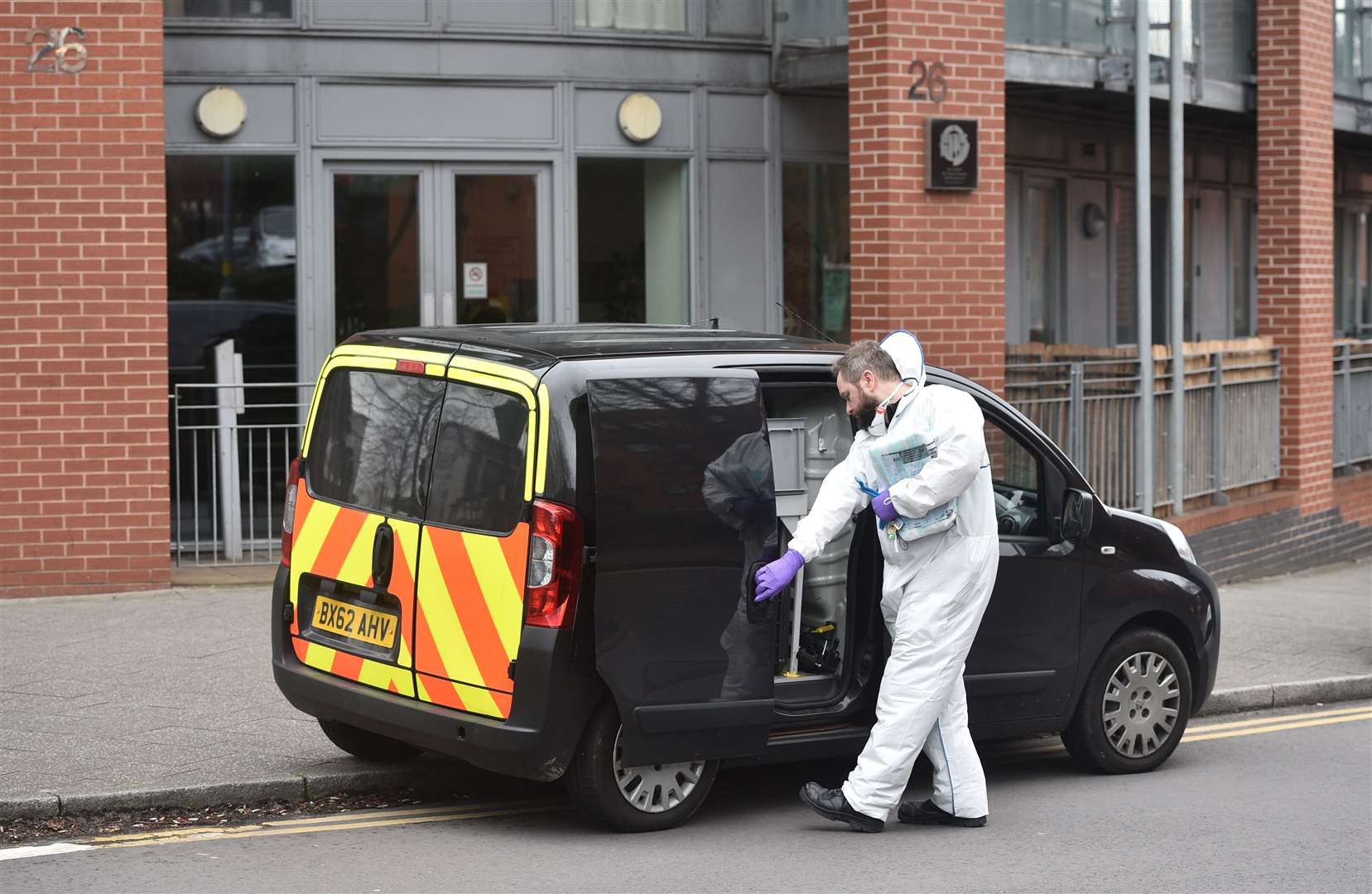 Police forensics officers at the scene (Ben Birchall/PA)