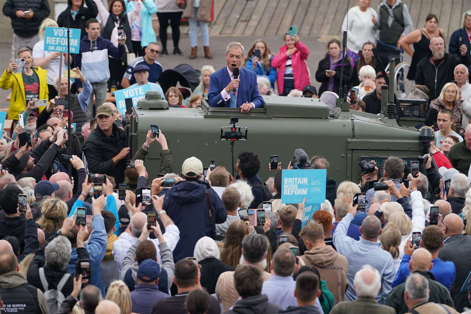 Reform UK leader Nigel Farage gives a speech to supporters on Clacton Pier in Essex, while on the General Election campaign trail (Lucy North/PA)