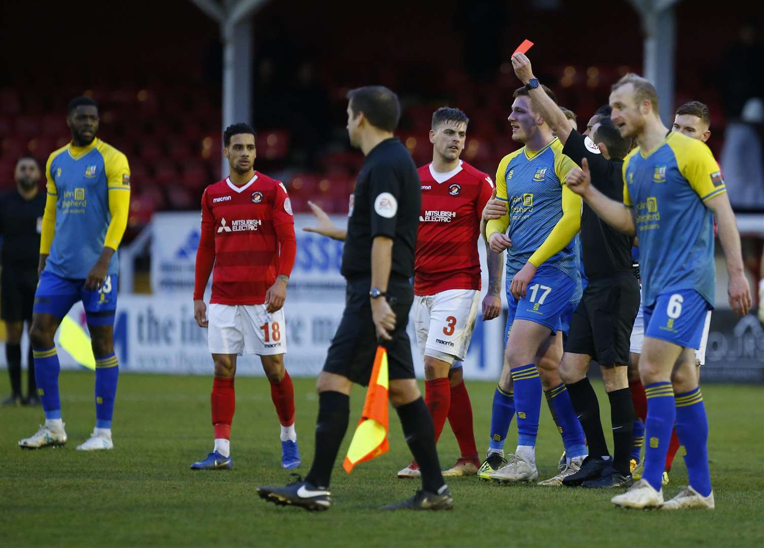 Referee Peter Gibbons showed four red cards in stoppage-time Picture: Andy Jones