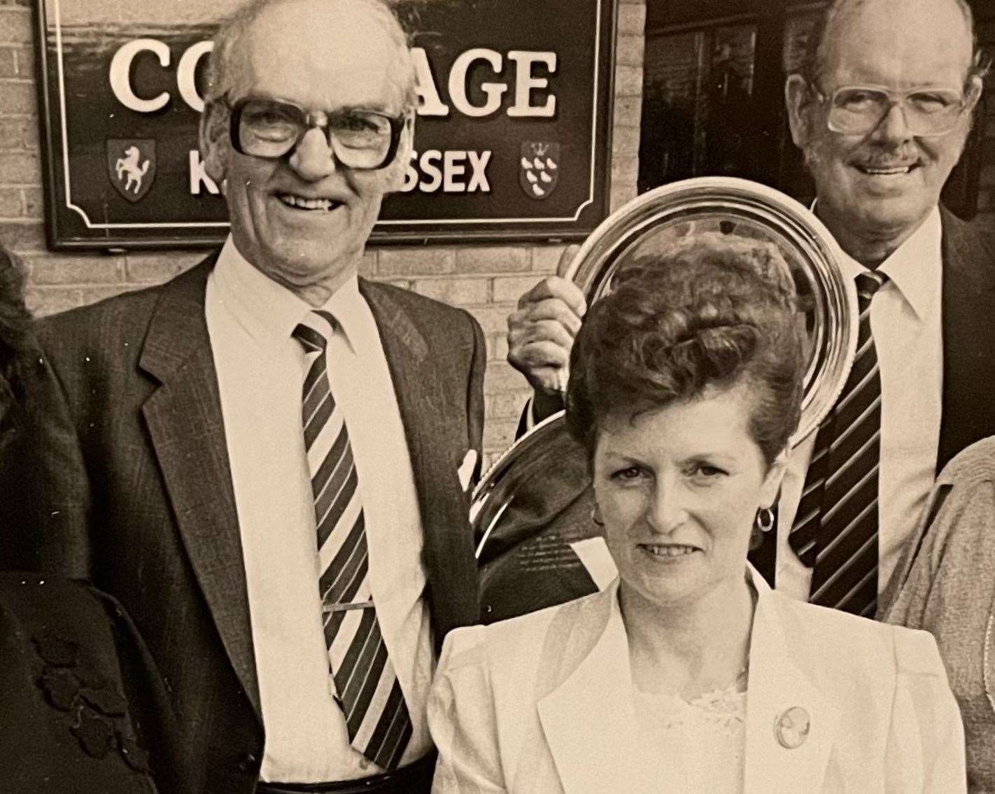 Sheila and Frank Baker receiving an award from the Courage Brewery for Best Cellar