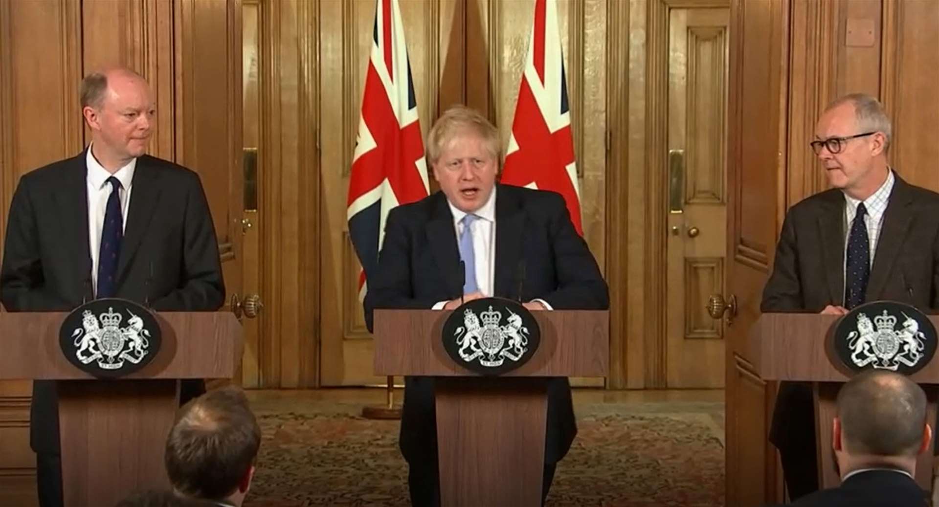 The soon-to-be familiar sight of the Prime Minister leading the Downing Street press conference flanked by chief medical officer for England Chris Whitty (left) and chief scientific adviser Sir Patrick Vallance (TV Pool/PA)