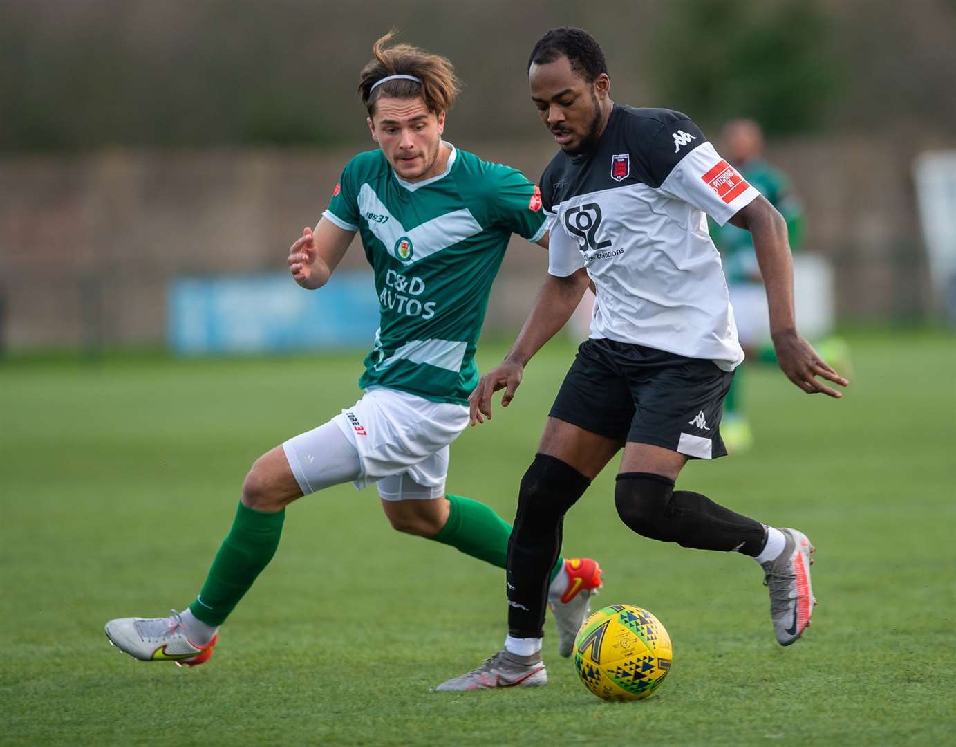 Rhyle Ovenden in action against Faversham before being stretched off with a knee injury Picture: Ian Scammell