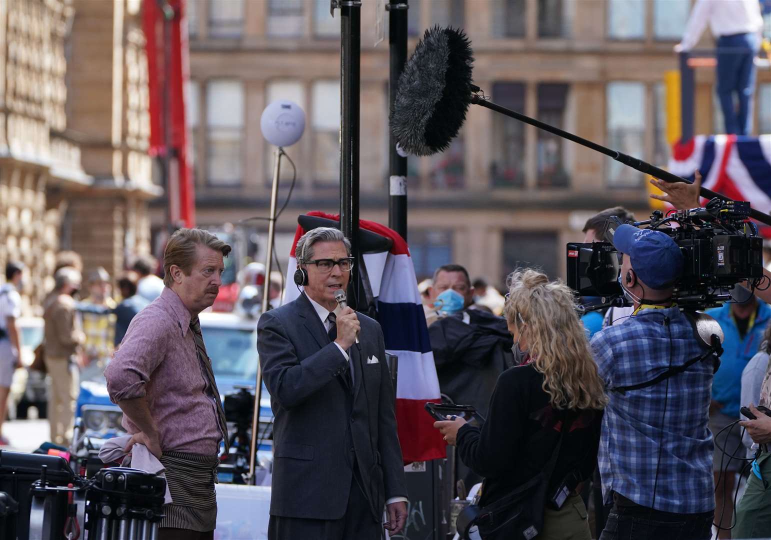 Cast members on Cochrane Street in Glasgow city centre (Andrew Milligan/PA)