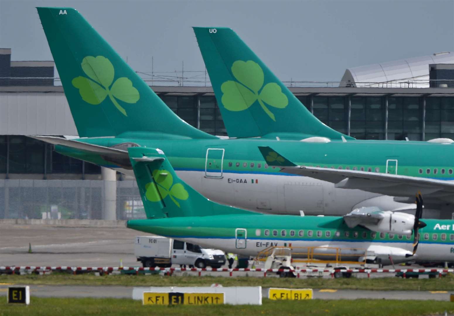 Aer Lingus planes at Dublin Airport as more flights were cancelled (Artur Widak/PA)