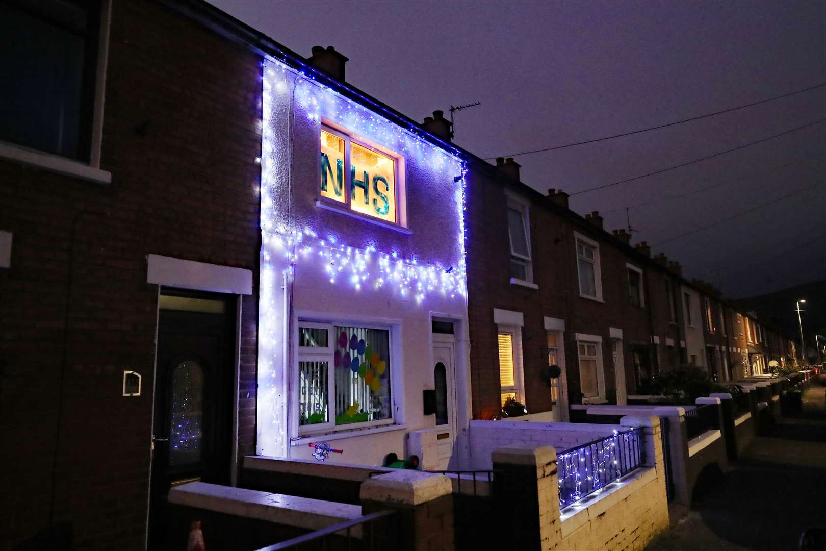 The Christmas lights help brighten up the darkest of times (Niall Carson/PA)