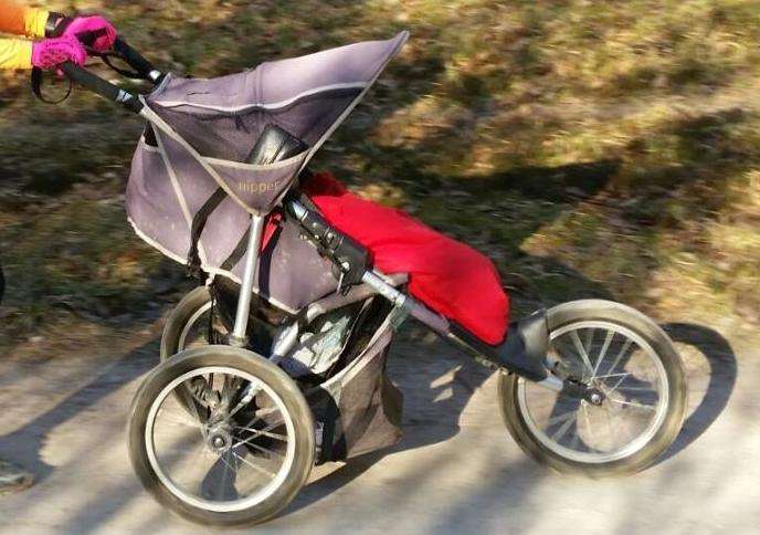 Patricia Smith worked with the grandmother to pull the buggy out of the canal. Stock image