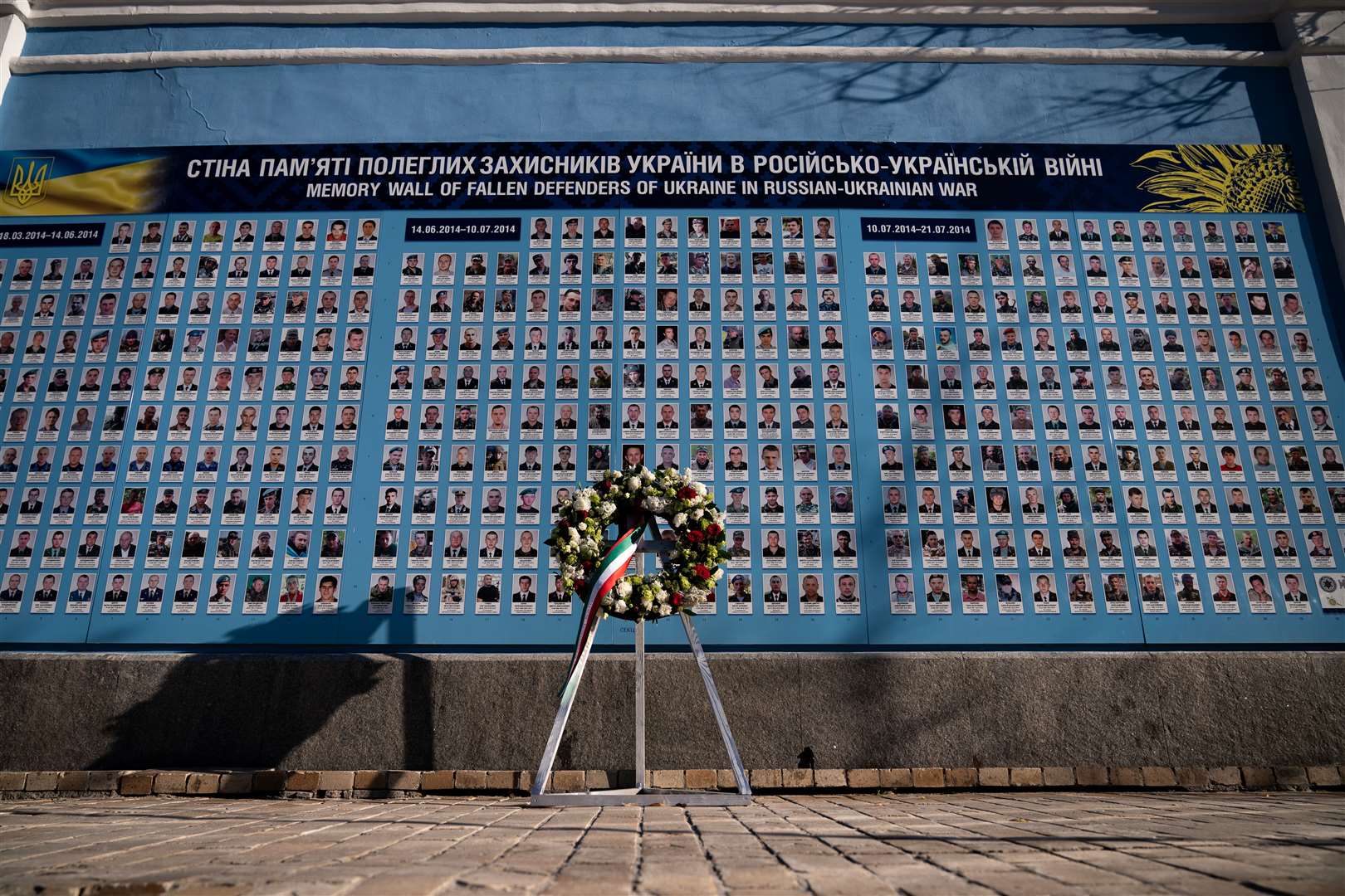 The wall of remembrance of the fallen for Ukraine at the Mykhailivsky Golden-Domed Monastery in Trohsvyatitelska Street, Kyiv (Aaron Chown/PA)