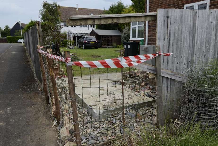 Damage caused when a Nissan Qashqai shot through a garden in Wittersham