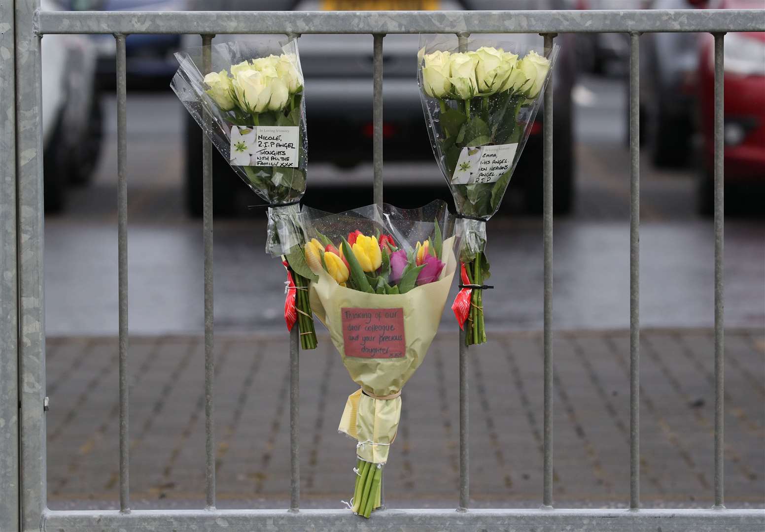 Flowers have been left to the victims outside University Hospital Crosshouse, near Kilmarnock (Jane Barlow/PA)