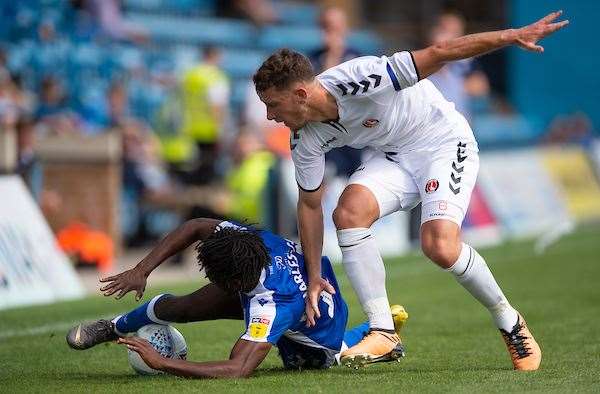 Regan Charles-Cook goes down under a challenge from Jason Pearce Picture: Ady Kerry (14058968)