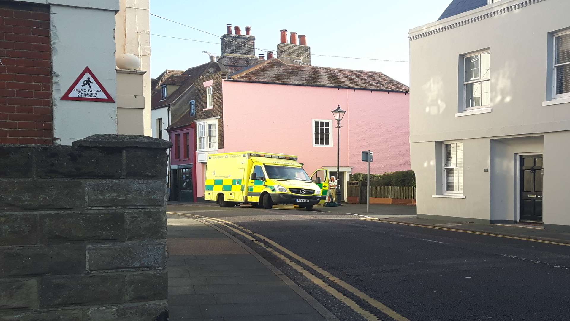 An ambulance in a nearby street