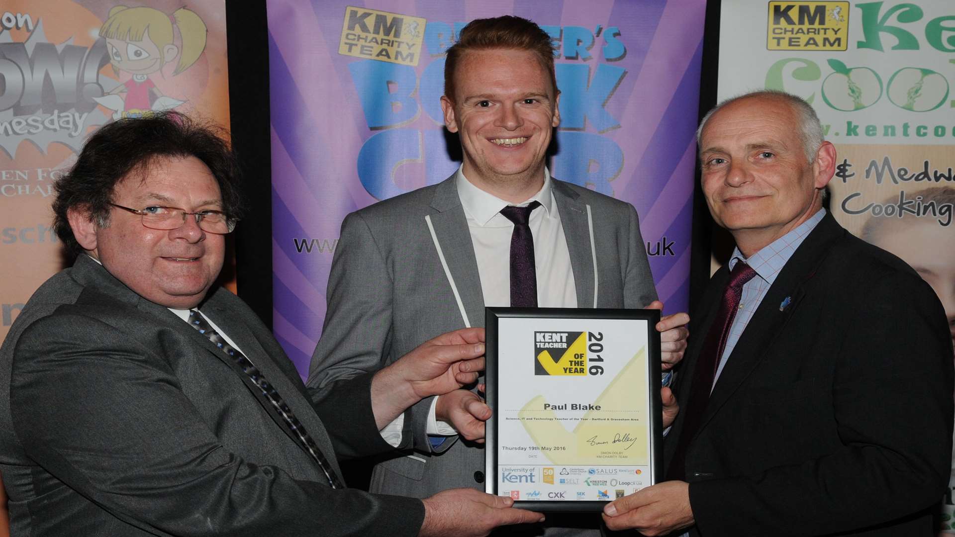 Paul Blake of The Leigh UTC, Dartford, is presented with his award by Phil Reynolds of Kreston Reeves and Richard Langshaw of Loop CR