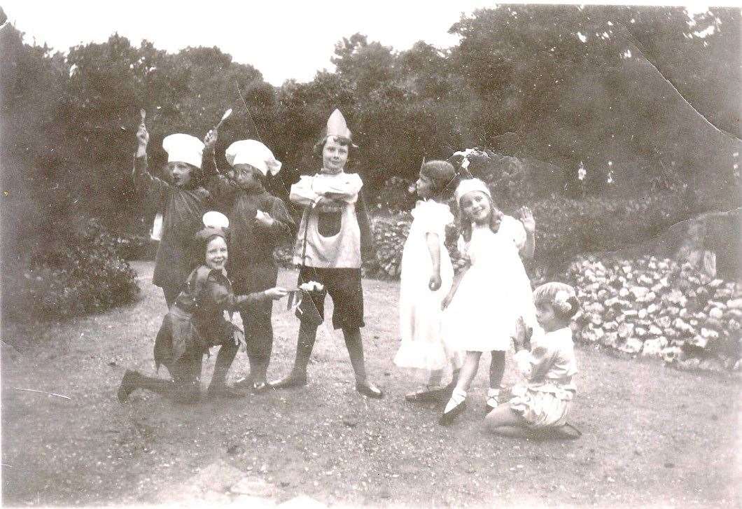 Audrey Hepburn (centre) in the driveway of The Old Vicarage, Elham. Picture: Elham Historical Society/Sampson Family Collection