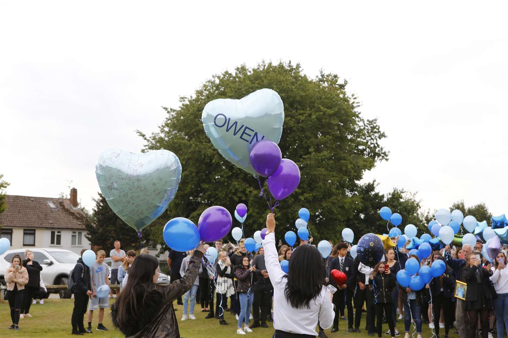 Balloons being released at The Ridge at a memorial for his death