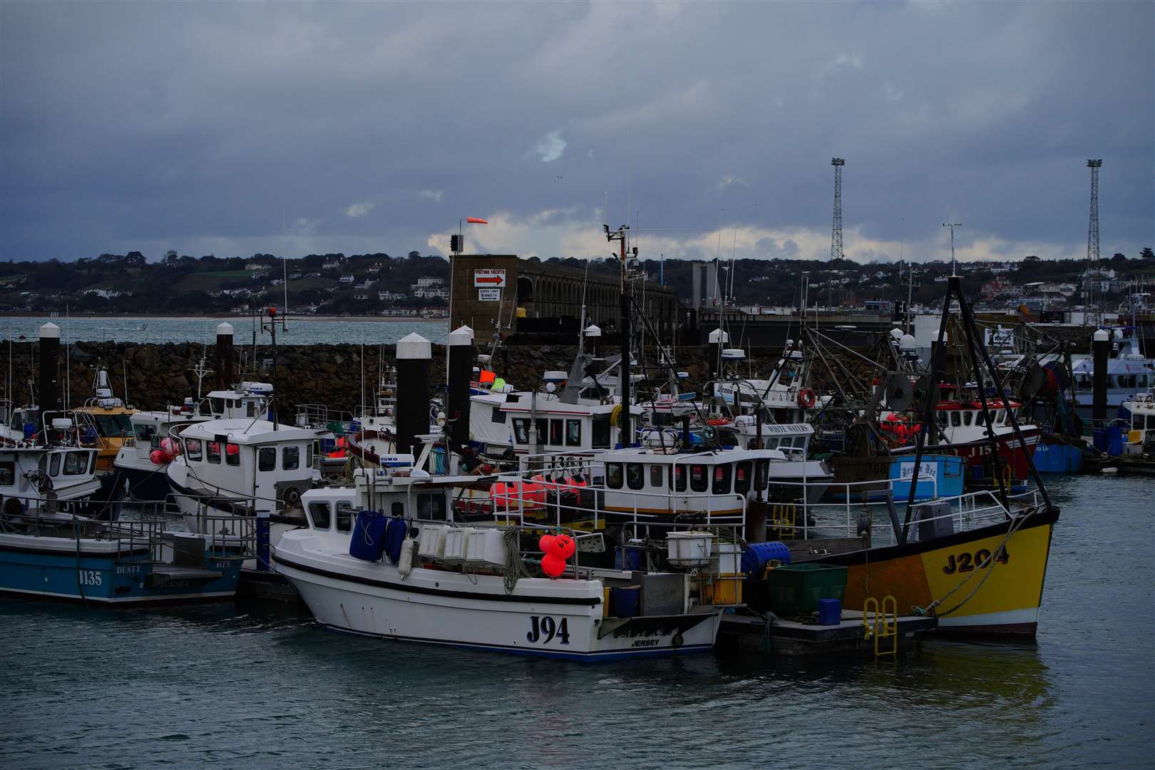 Fishing boats remain in the harbour at St Helier, Jersey (Ben Birchall/PA)