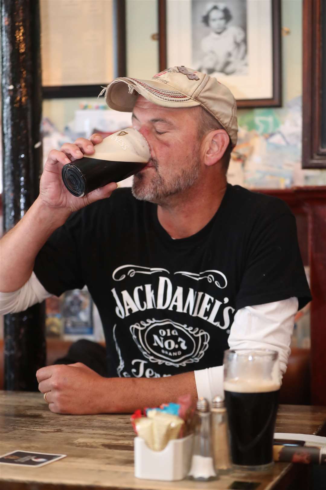 Angus Fleming has a pint of Guinness in Mary Mac’s on Monday (Niall Carson/PA)