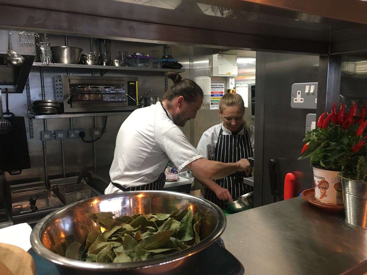 The team hard at work in the open kitchen at Marc-Pierre's Kitchen. (20140058)