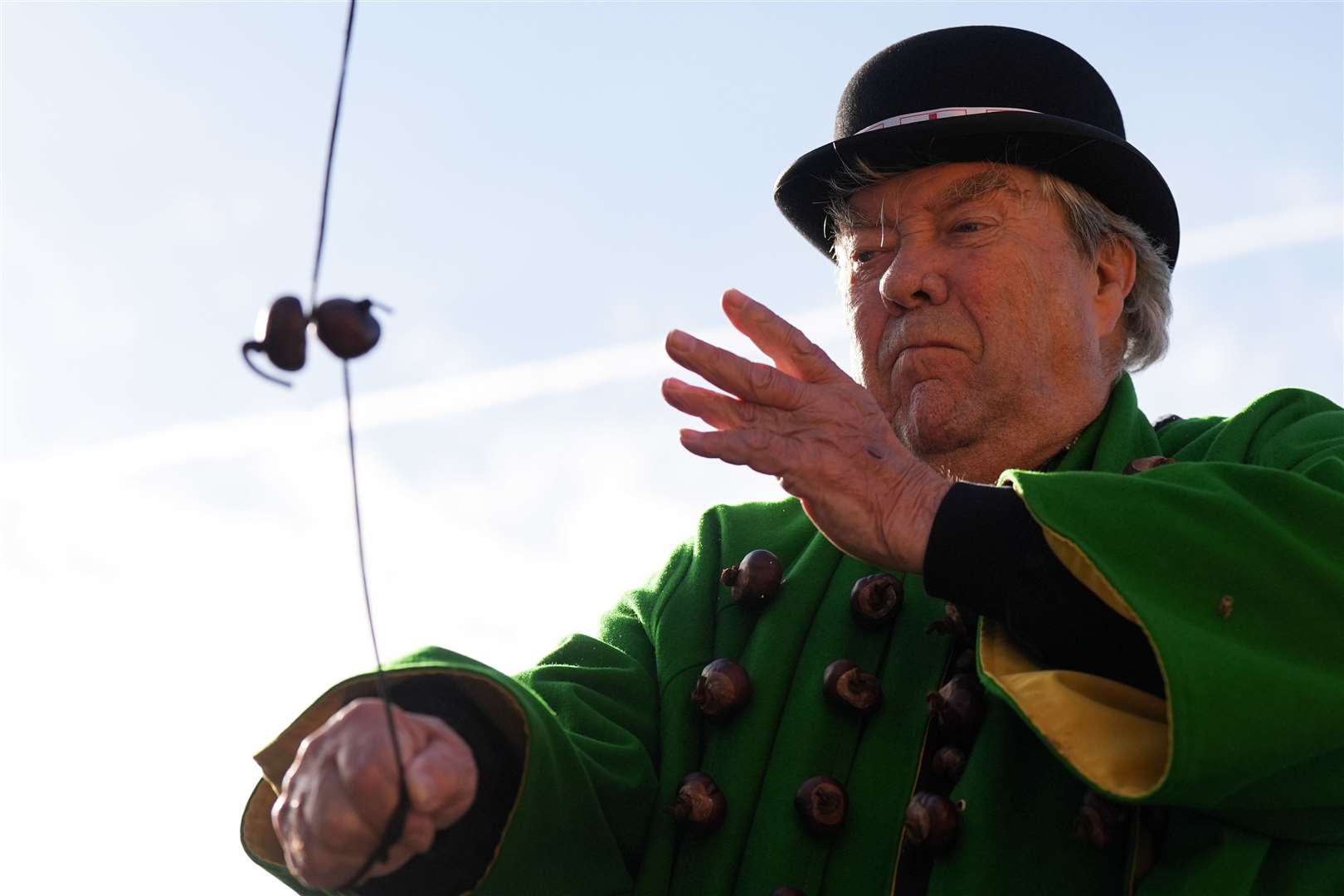 David Jakins, who is also known as King Conker, taking part in the annual World Conker Championships (Jacob King/PA)