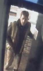 Another CCTV image of a man entering the bar