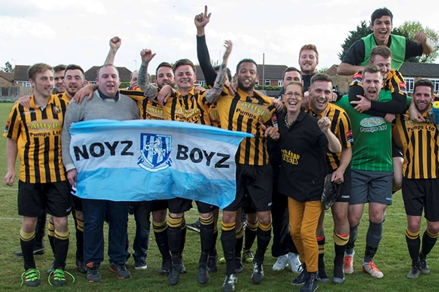 Folkestone celebrate with fans after securing their place in the Ryman Premier Division for next season
