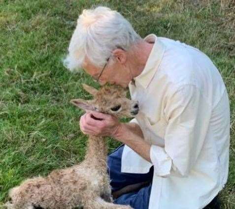 Paul O'Grady with one of his newborn alpacas