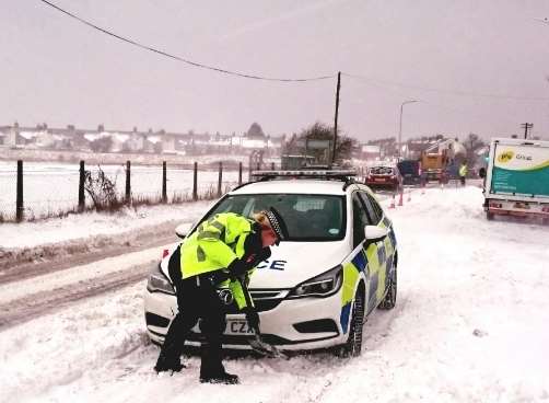 Even police cars were stuck in the snow on the Halfway Road on Sheppey. Picture: Swale Police via Twitter
