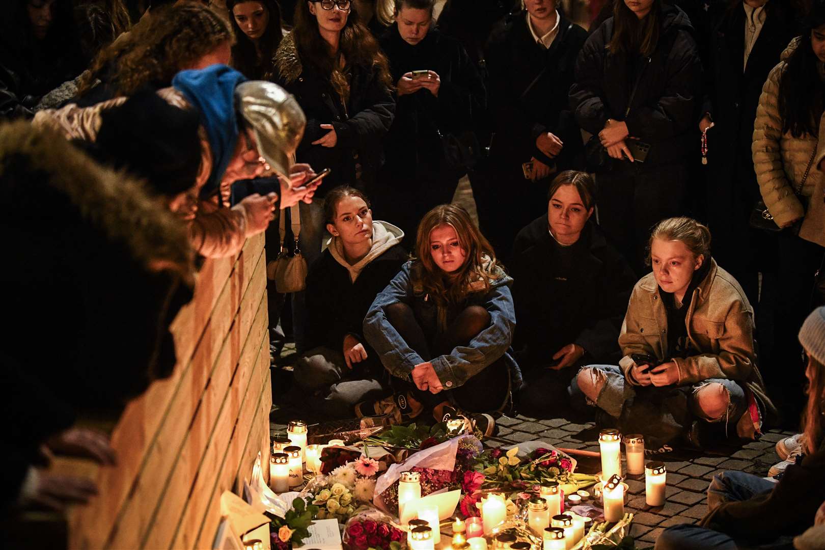 Swedish fans gather for a vigil to pay tribute to the singer (Mikaela Landestrom/TT News Agency via AP)