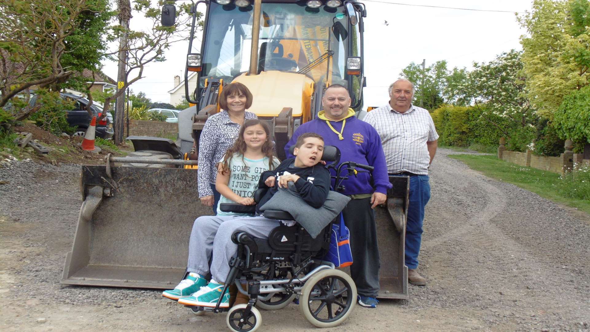 Miles with his dad George, little sister Milley, Jeanette Hale and an employee of Taylor Bros