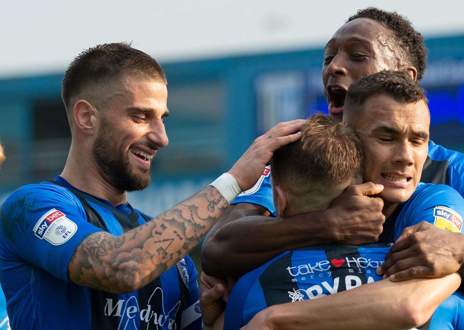 Max Ehmer, left, joins the celebrations after Mark Byrne's equaliser against Rochdale Picture: Ady Kerry