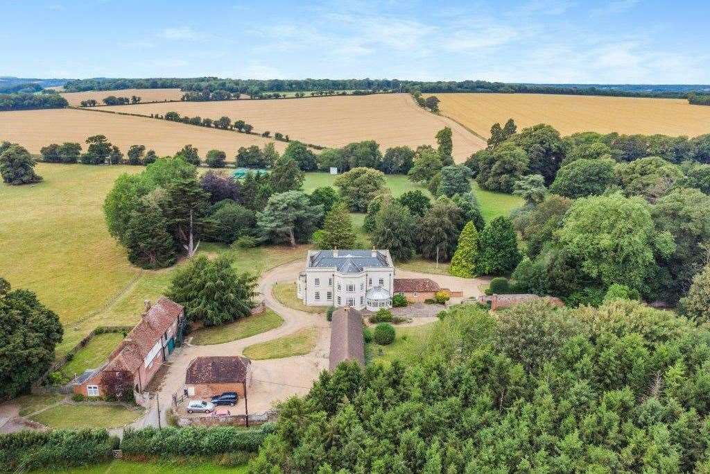 An aerial view of the house and parkland