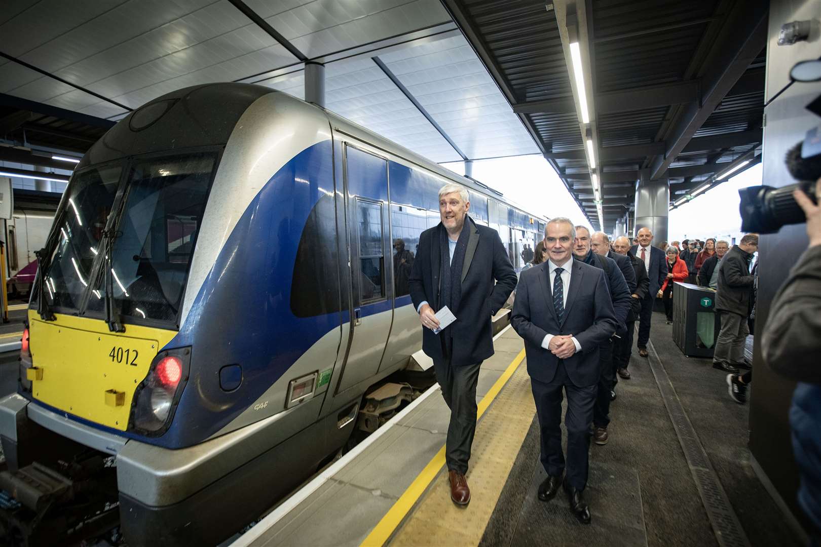 Infrastructure minister John O’Dowd arrived on one of the first trains into the new Belfast Grand Central Station in October (Brian Morrison/Department of Infrastructure/PA)