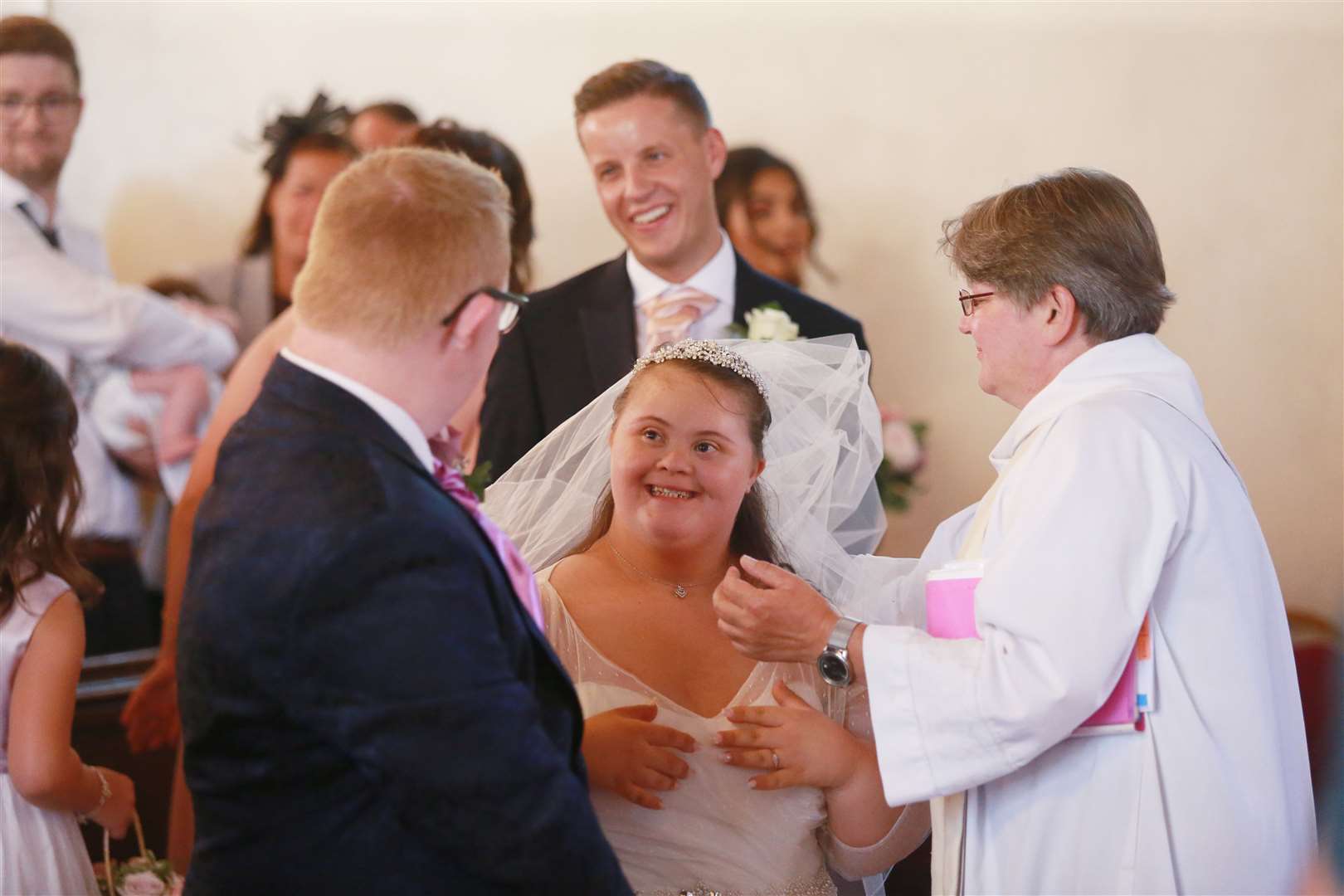 Kieran Duffy sees his bride to be, Emma Houckham, for the first time at All Saints Church, Staplehurst. Picture: John Westhrop.. (15674245)