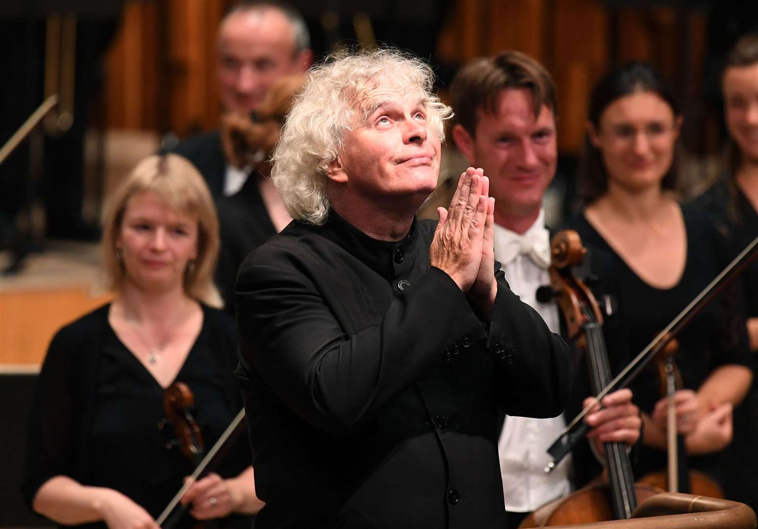 Sir Simon Rattle conducts his first concert as music director of the London Symphony Orchestra at the Barbican (Doug Peters/PA)