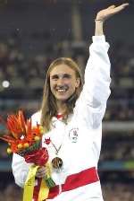 MAGIC MOMENT: Lisa Dobriskey waves to the crowd after her victory. Picture: TONY FEDER/AP/EMPICS.