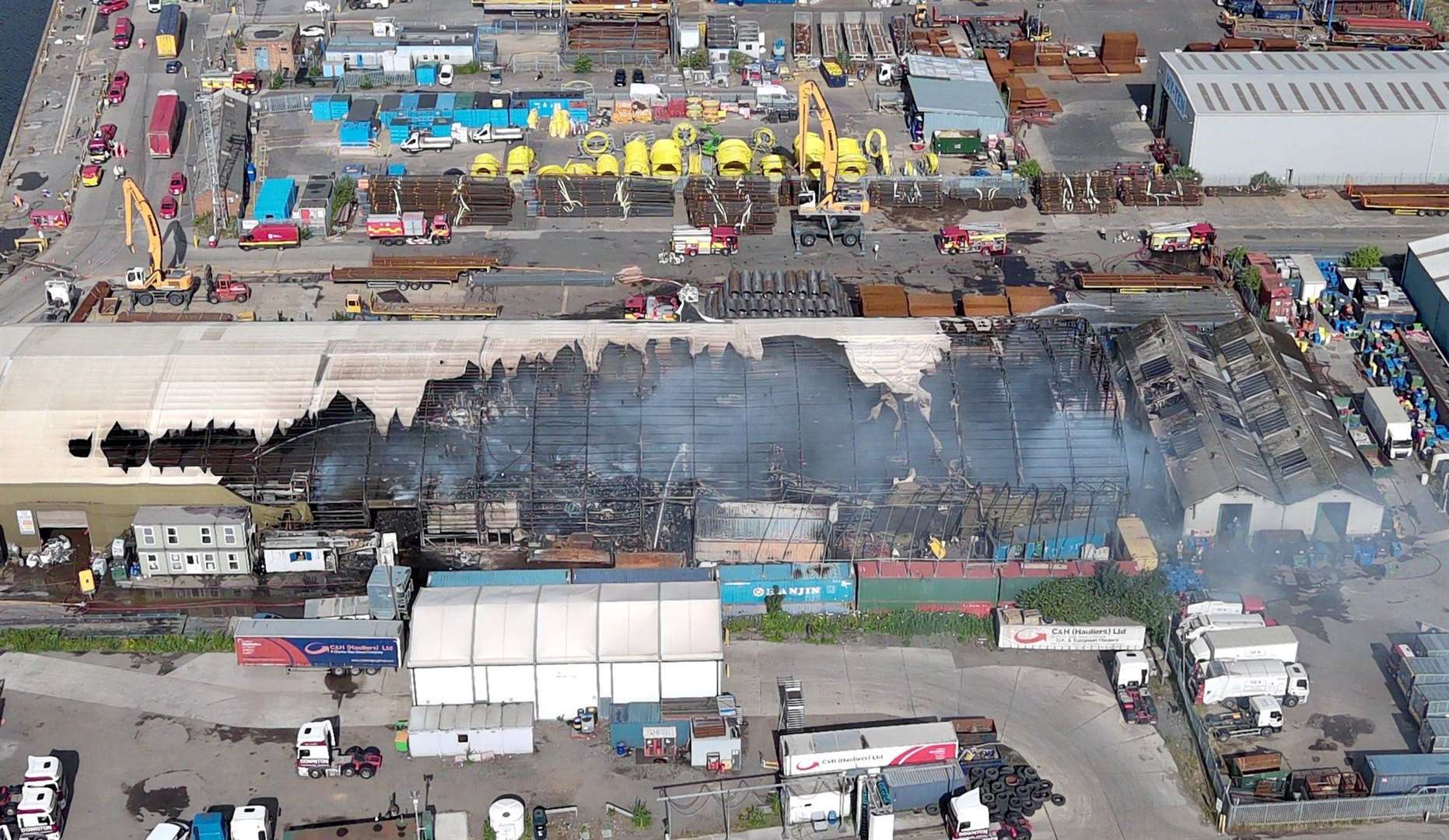 Drone images show the extent of the damage to the warehouse at Chatham Docks. Picture: @AerialimagingSE