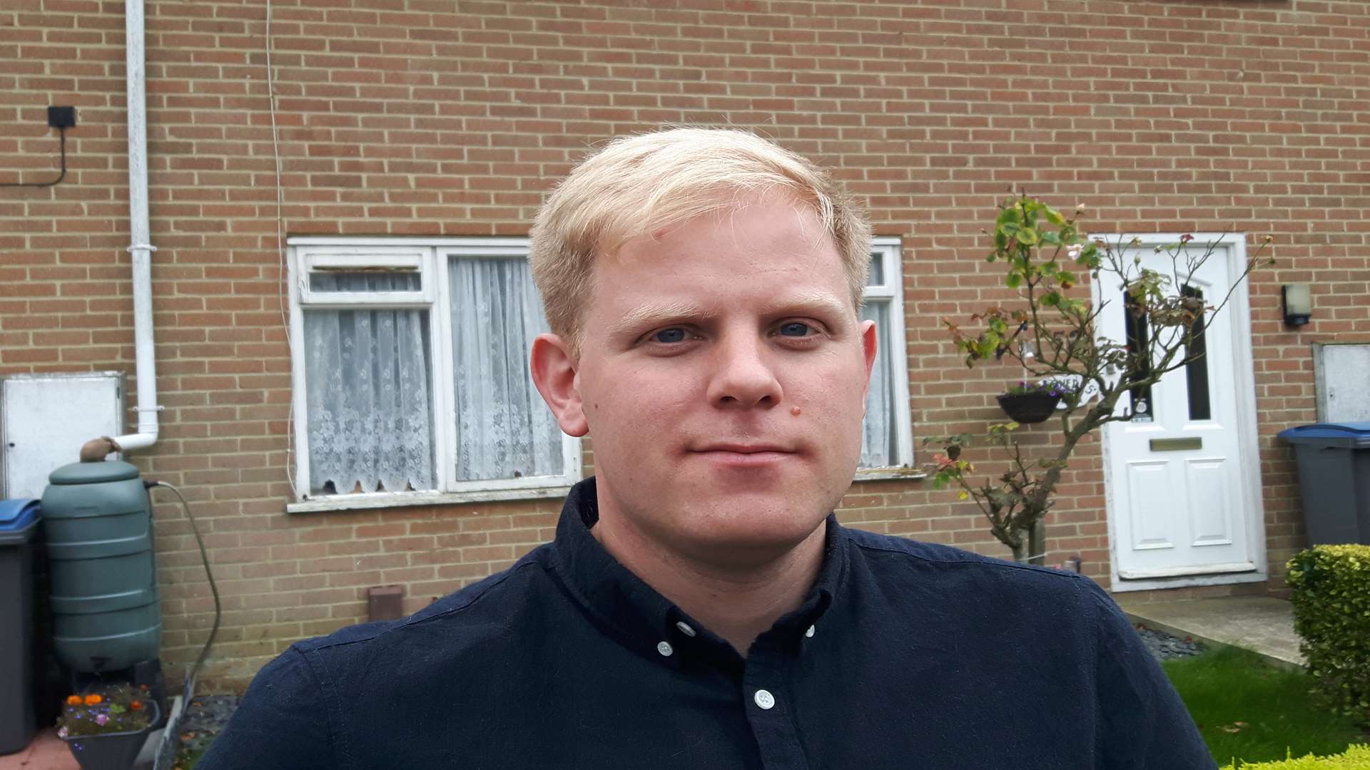 Michael Sutton outside the house from where the pensioner was rescued