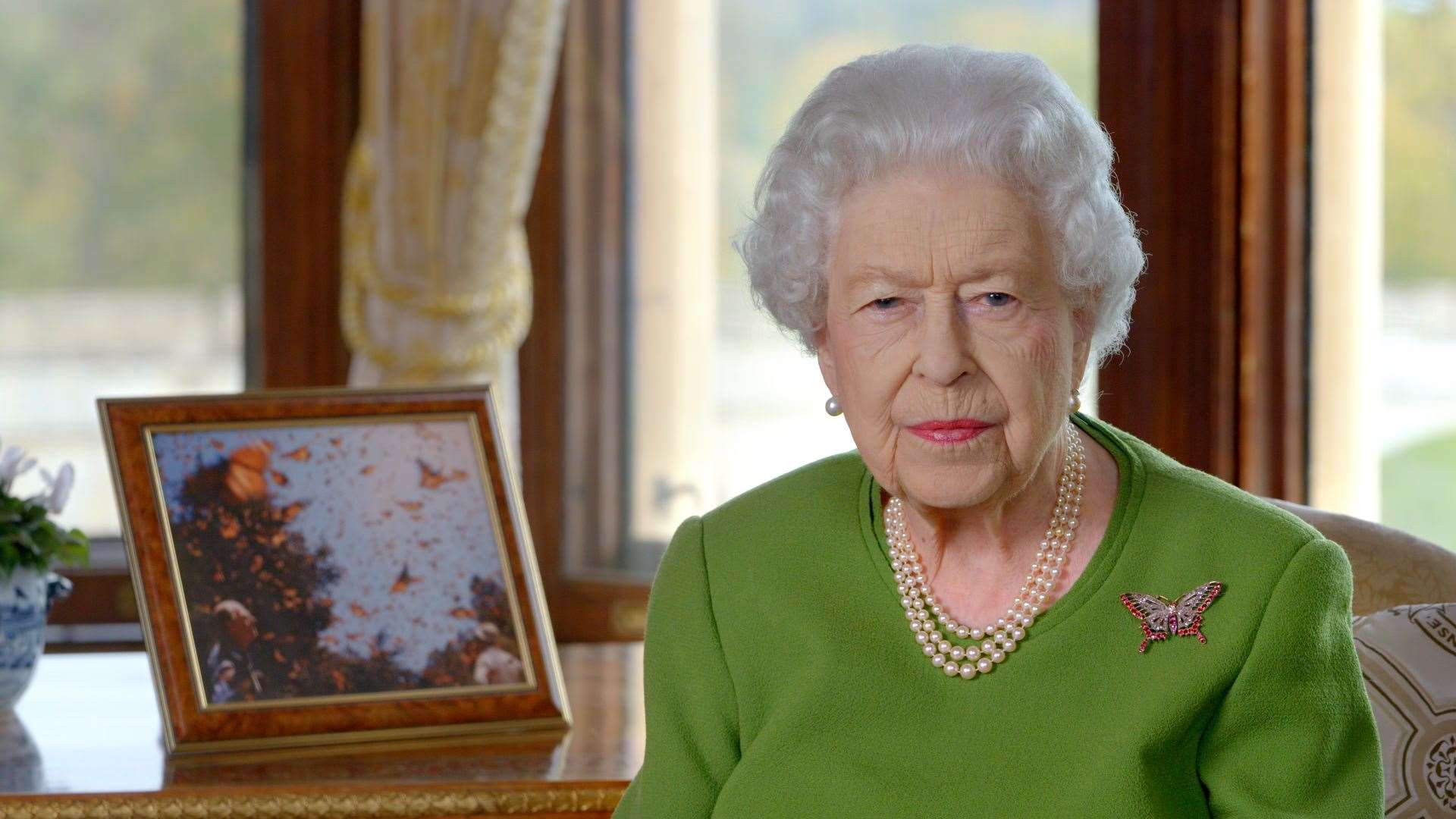 A photograph of her late husband during a visit to Mexico in 1988 was on display during the Queen’s video message (Buckingham Palace/PA)