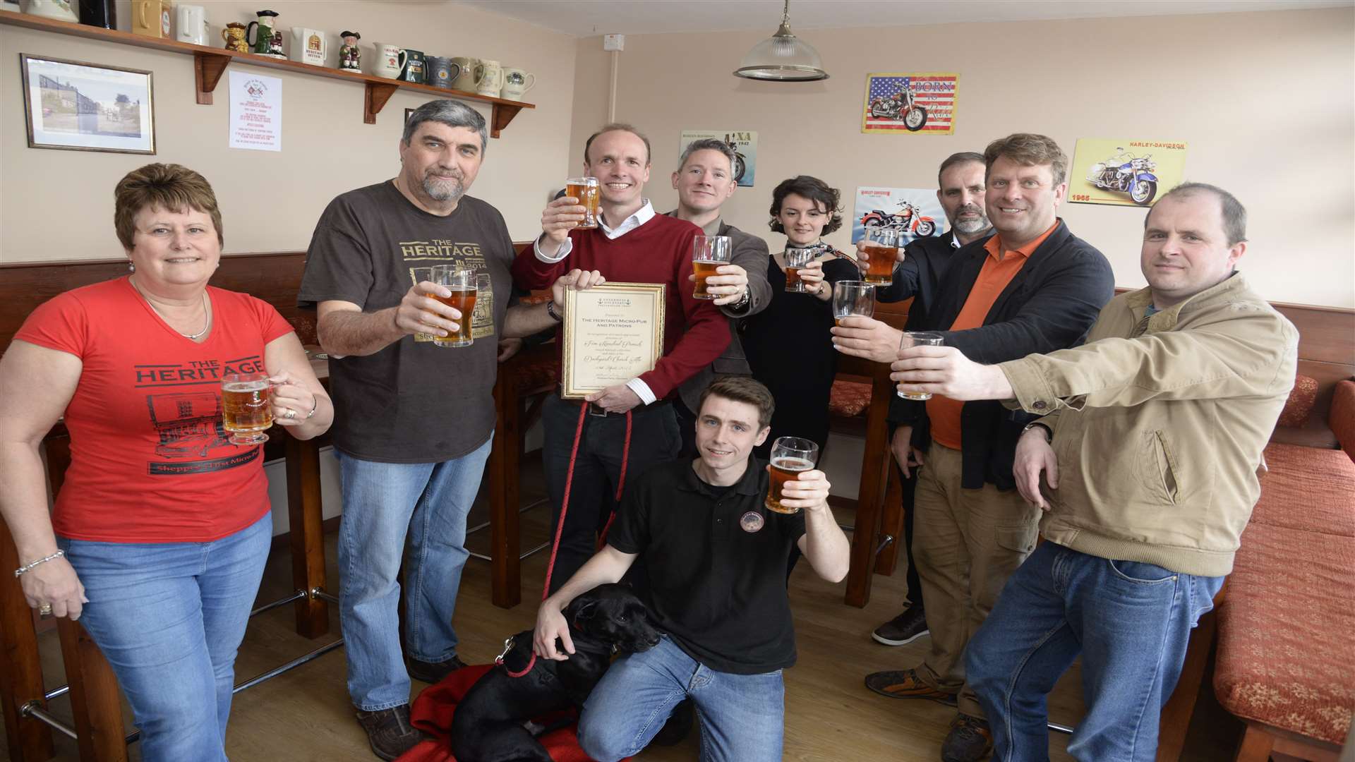 Margaret and Melvin Hopper with Will Palin and Sheerness Dockyard Preservation Trust members and front Brewer Mike Meaney of the Madcap Brewery at The Heritage in Halfway