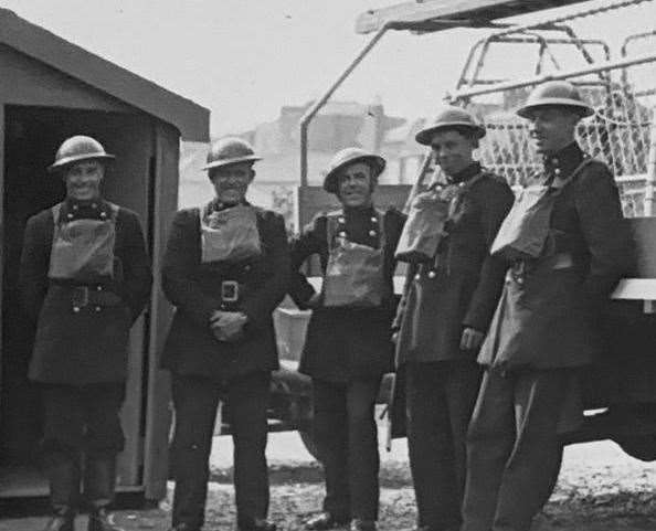 Albert Scrivens, pictured middle, with fellow firefighters. Picture courtesy of Kent Fire and Rescue Service