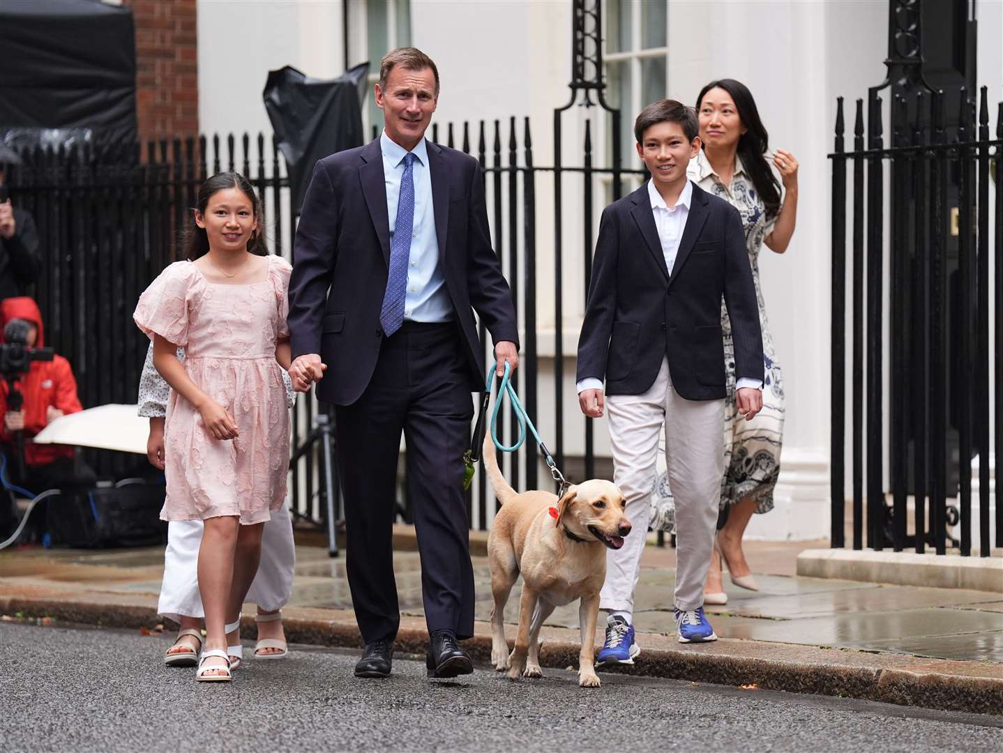 Outgoing chancellor Jeremy Hunt, with his wife Lucia and their children Jack, Anna and Eleanor, leaves 11 Downing Street after Labour’s victory (James Manning/PA)