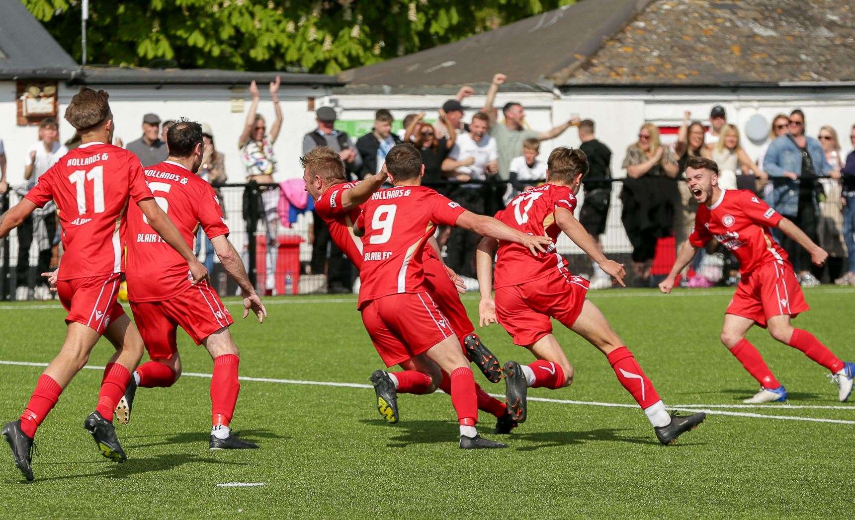 Hollands & Blair celebrate their second goal against Fisher – which won them the game Picture: Les Biggs