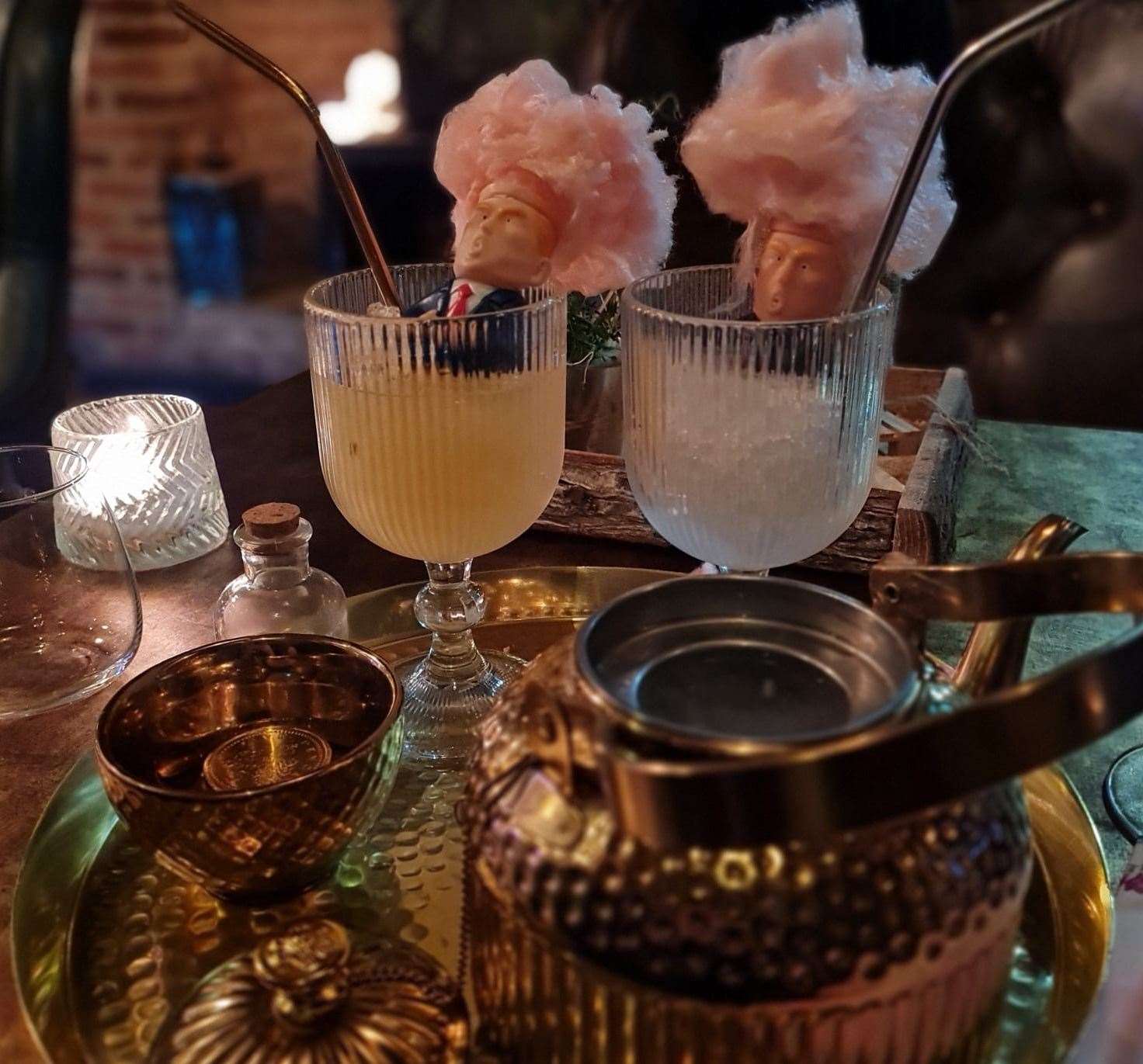 The Donald Trump sharing cocktail was served in a golden teapot