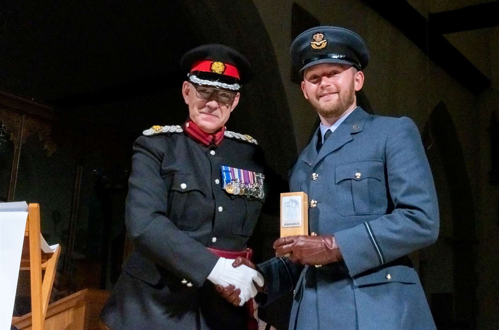 Deputy Lord-Lieutenant Brigadier Andrew Wood TD DL VR presented Luke Tyler with his volunteer of the year award