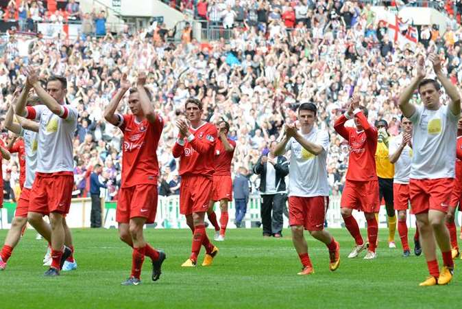 Tunbridge Wells players applaud their supporters at Wembley